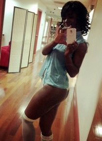 Horny black coed showing